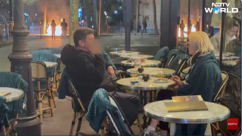 Vídeo de casal tomando drinque enquanto Paris enfrenta protestos e confrontos viraliza